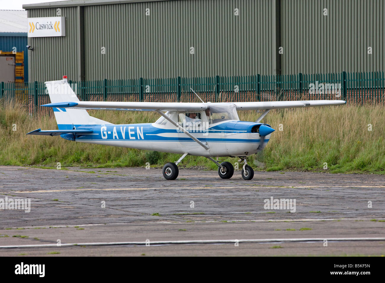 Reims Cessna 150G G-AVEN taxiing to end of runway ready to take-off from Sandtoft Airfield Stock Photo