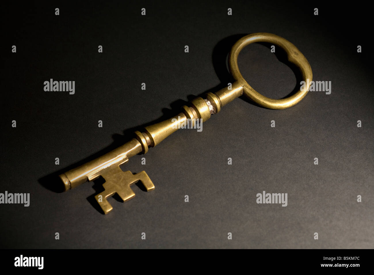 A large brass key Stock Photo - Alamy
