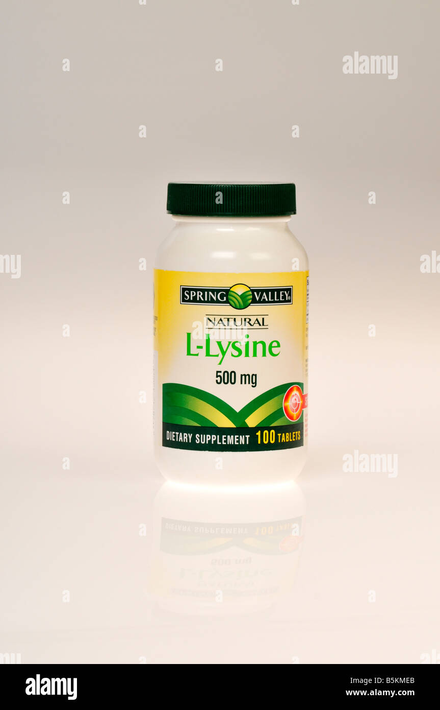 L-Lysine 500 mg vitamin supplement bottle on white background cutout Stock Photo