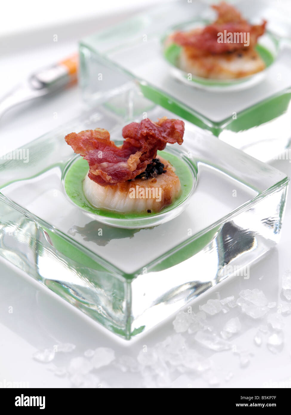Seared scallops gourmet appetizers editorial food Stock Photo - Alamy