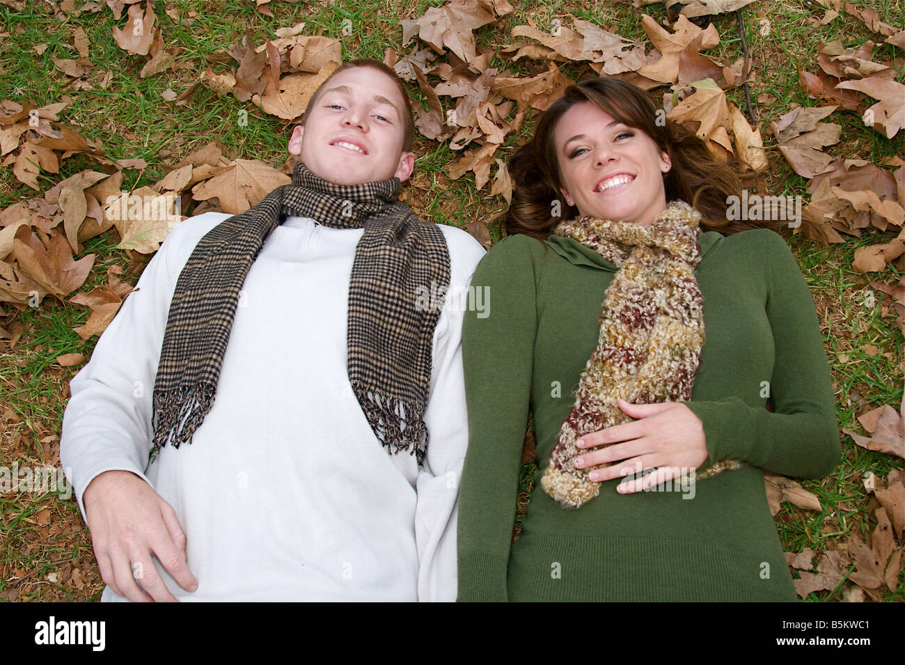 Young couple in an autumn forest picnic area Stock Photo - Alamy