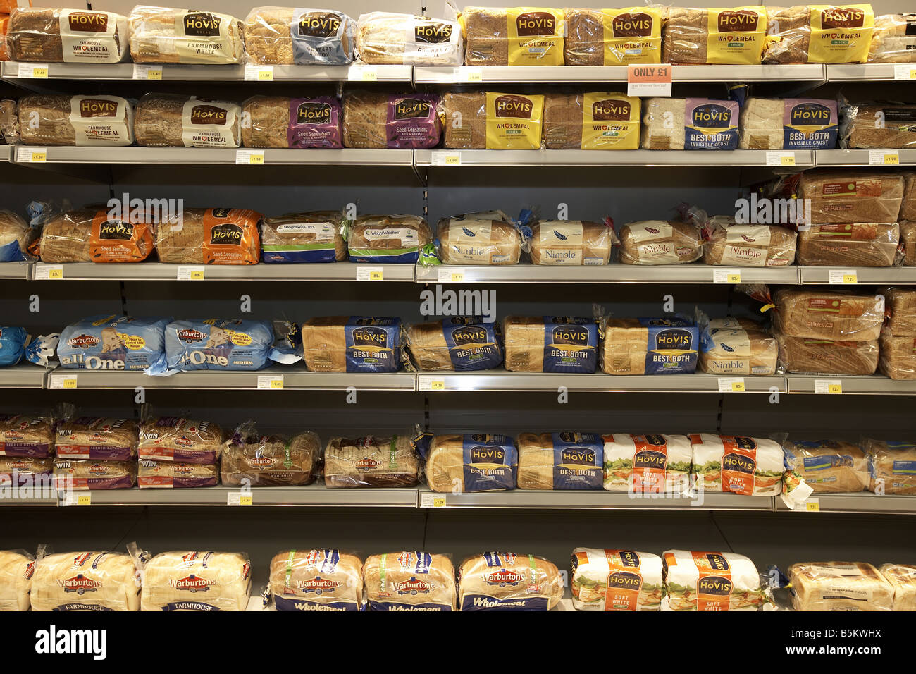 Bread stacked on supermarket shelves Supermarket interior Stock Photo Alamy