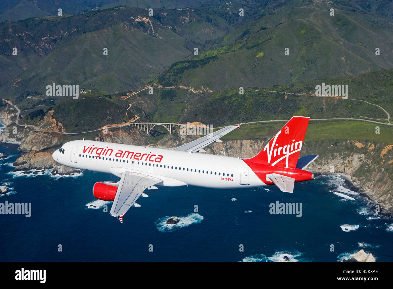 aerial air to air Virgin America air lines Airbus A320 over Pacific coast northern California Stock Photo