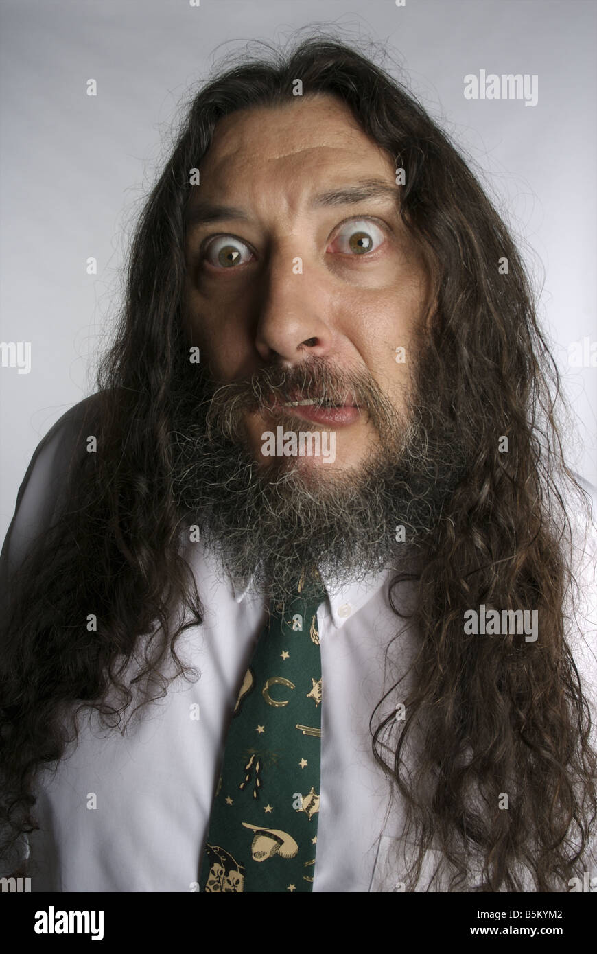 Man with long hair and beard wearing tie Stock Photo - Alamy