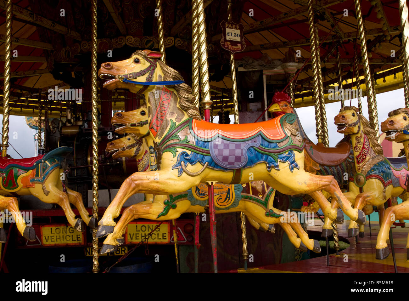 traditional fairground horse merry go round ride at astle park country