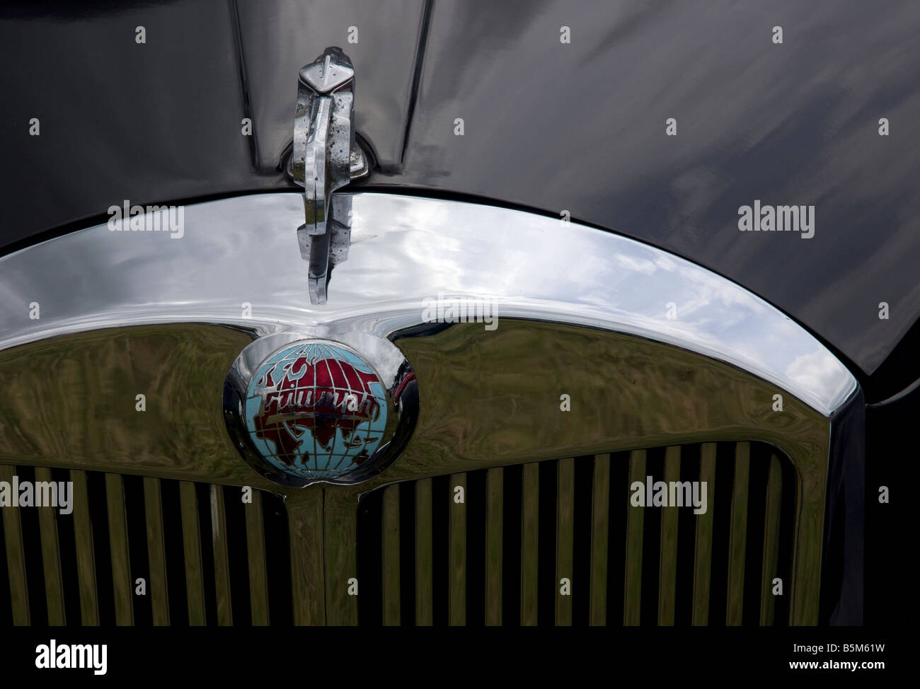 triumph vintage car with chrome grille and reflections Stock