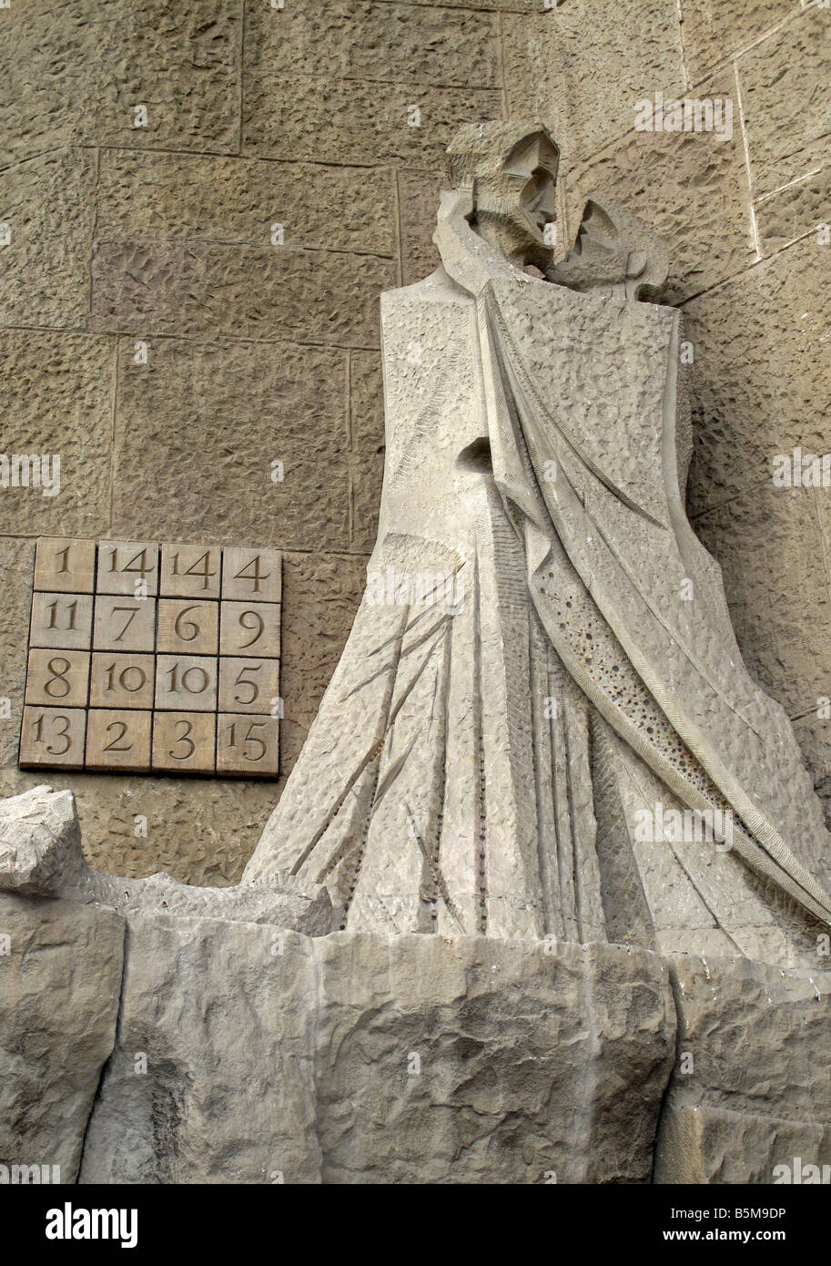 Judas' kiss of betrayal and cryptogram code square on Main entrance of Gaudi's La Sagrada Familia cathedral Barcelona, Spain Stock Photo