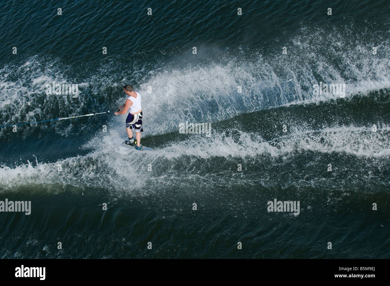 Waterskier in action at waterski and wakeboard competition in Putrajaya, Malaysia Stock Photo