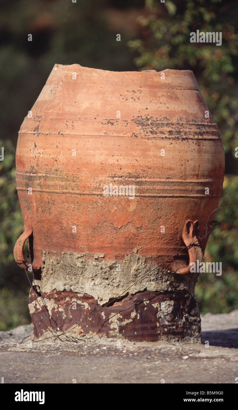 a pithoi (jug) used as a chimney Crete Greece Stock Photo