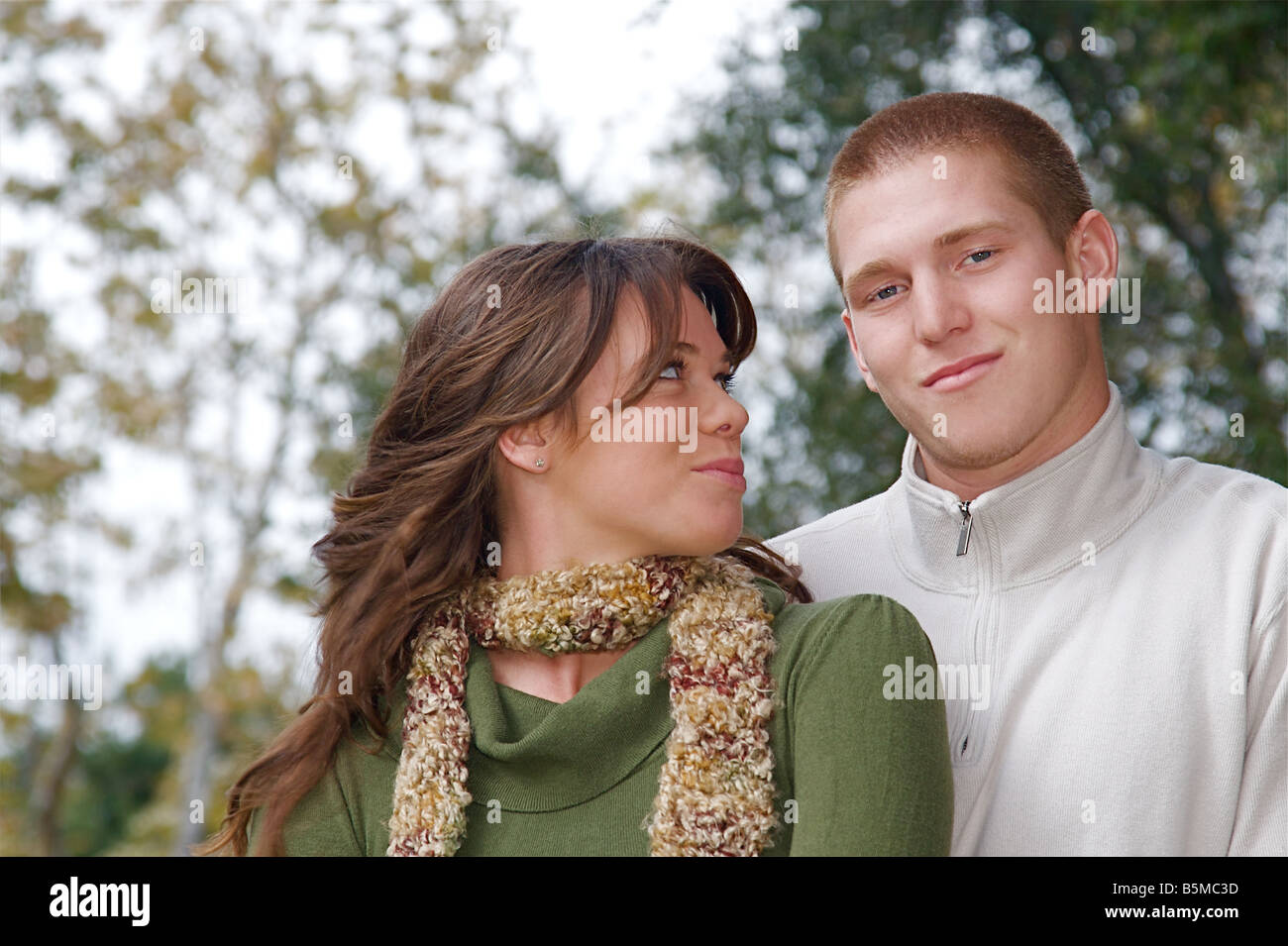 Cute teen couple in forest hi-res stock photography and images - Alamy
