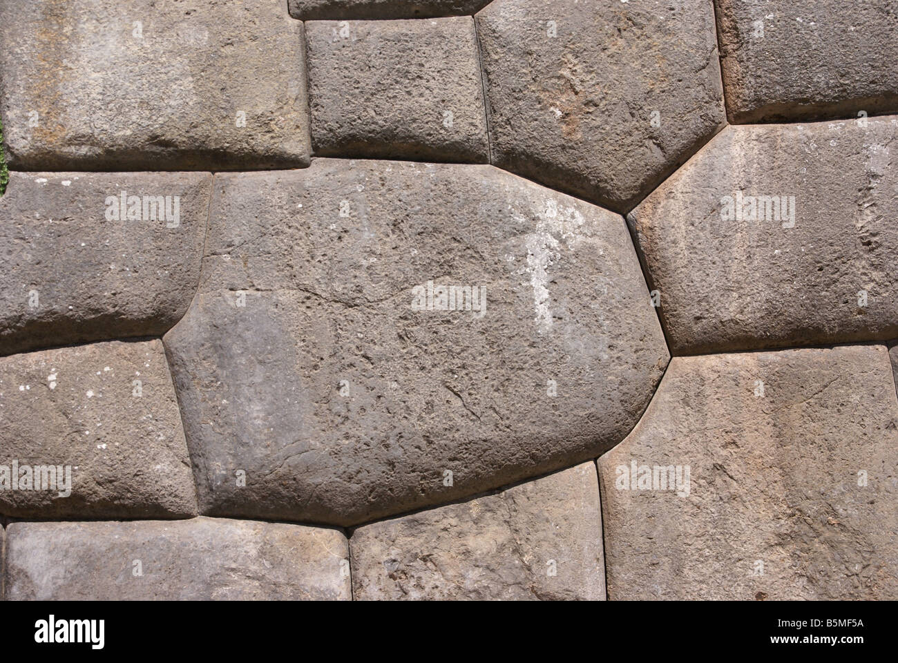 Massive stones in Inca fortress walls Sacsayhuaman Cusco Peru South America Stock Photo