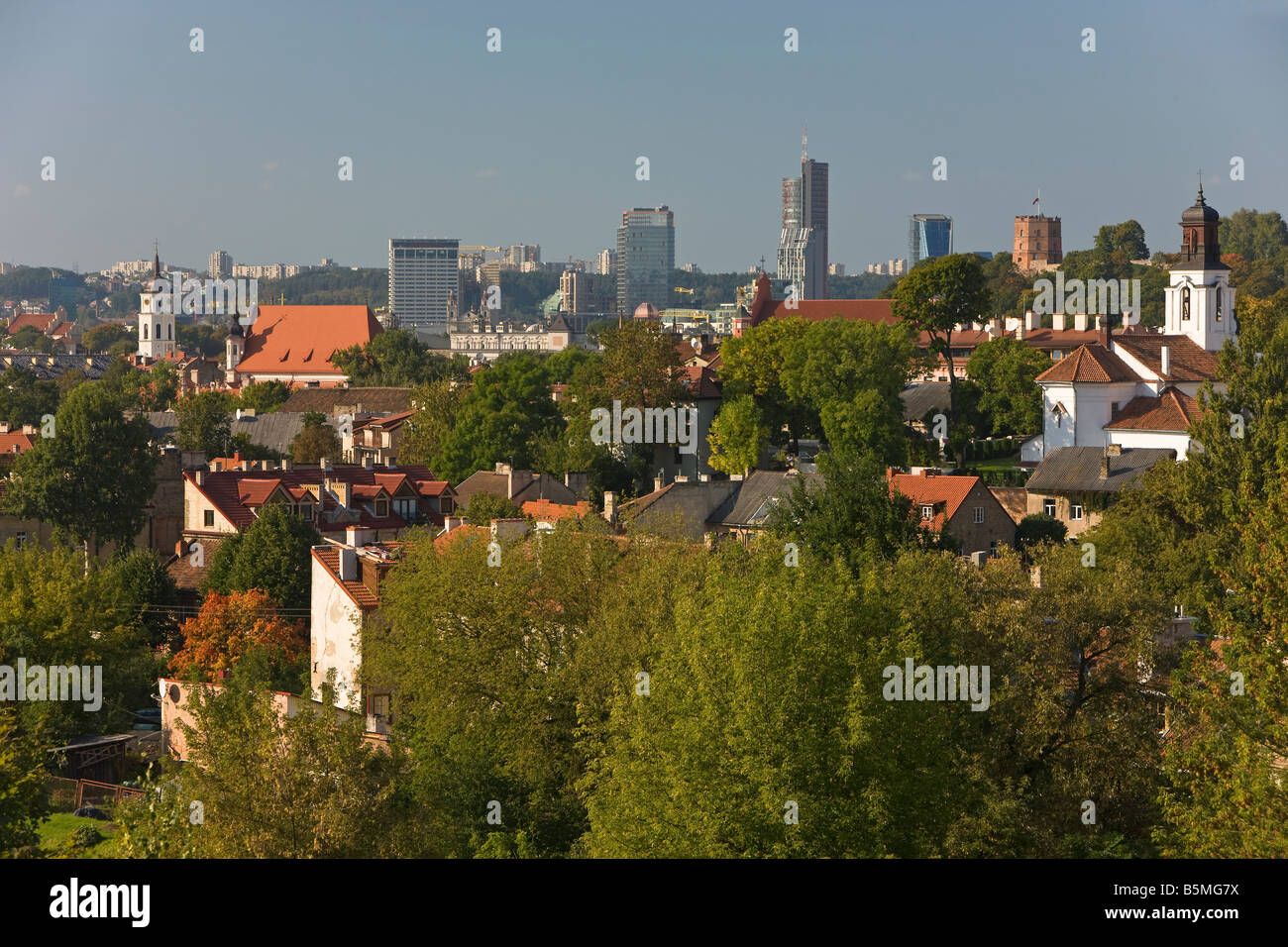 Baltic States, Lithuania, Vilnius, view over the Old Town to the modern city skyline Stock Photo