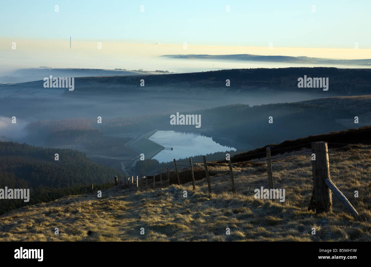 Emley Moor Television Mast and Yateholme Reservoir from Wilmer Hill in The Peak District looking North over Holme Stock Photo