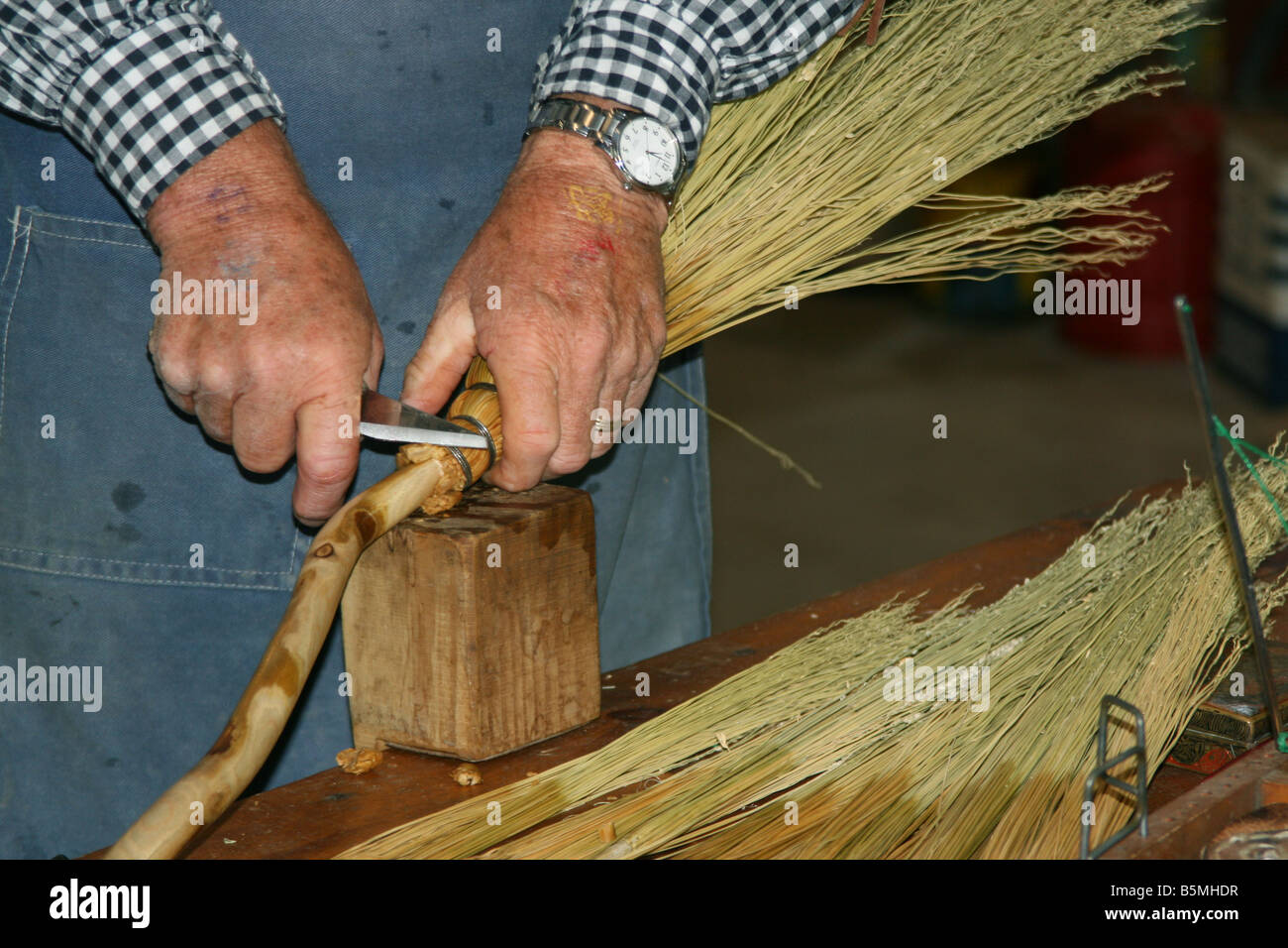 Broom Maker Stock Photo
