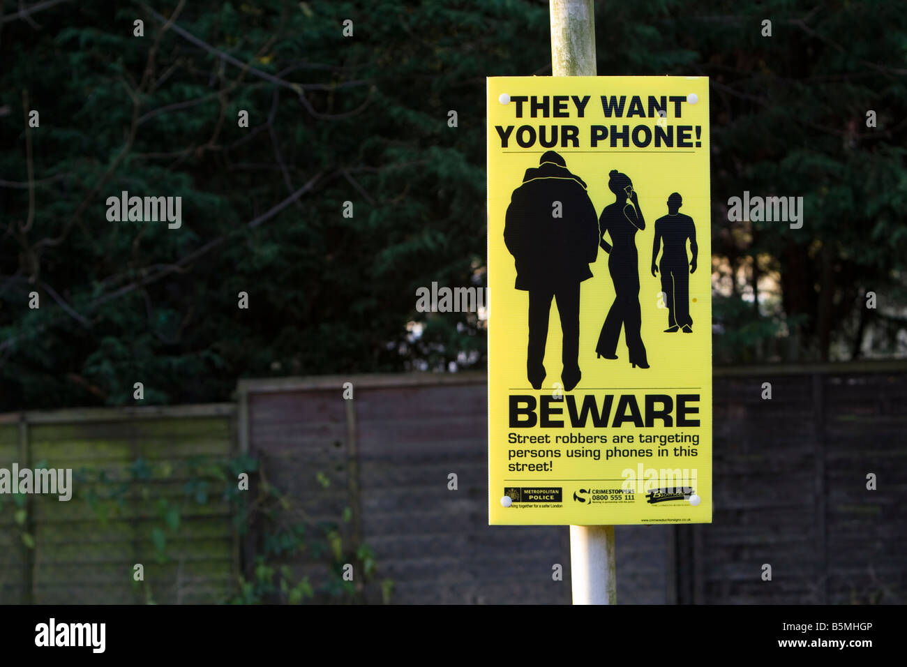 Car park and street crime prevention sign 'They want your phone' London Borough of Bromley and the Metropolitan Police. Stock Photo
