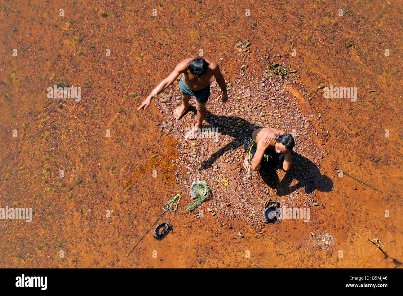 Two boys fishing in river hi-res stock photography and images - Alamy