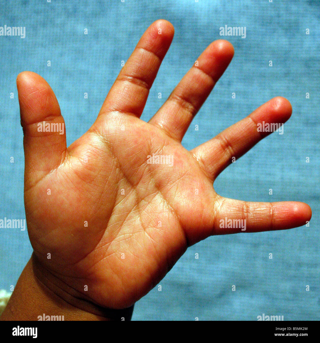 child hand dark skin the lines of the kid hand Stock Photo Alamy