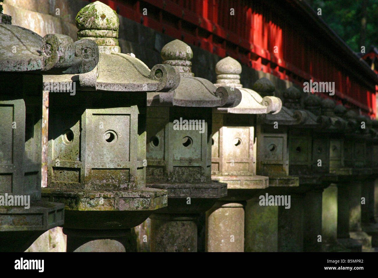 A Row of Stone Garden Lanterns at Nikko Toshogu Shrine Nikko Tochigi Japan Stock Photo