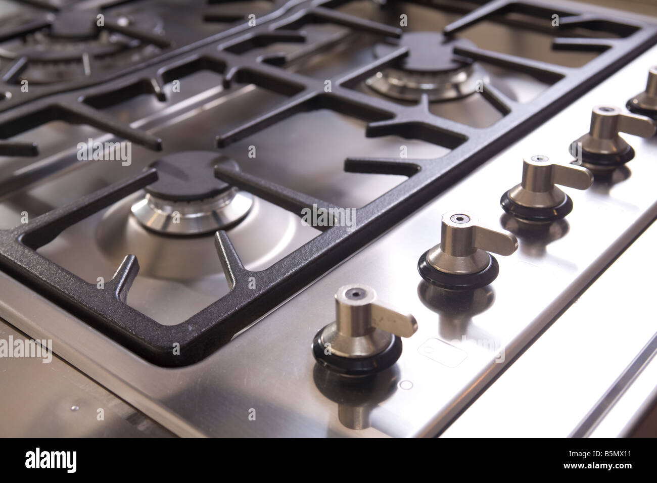 Modern style stainless steel gas stove with power buttons Stock Photo Alamy