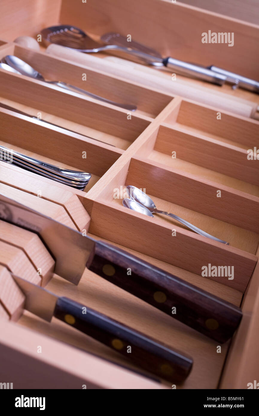 Kitchenware in the drawer Stock Photo - Alamy