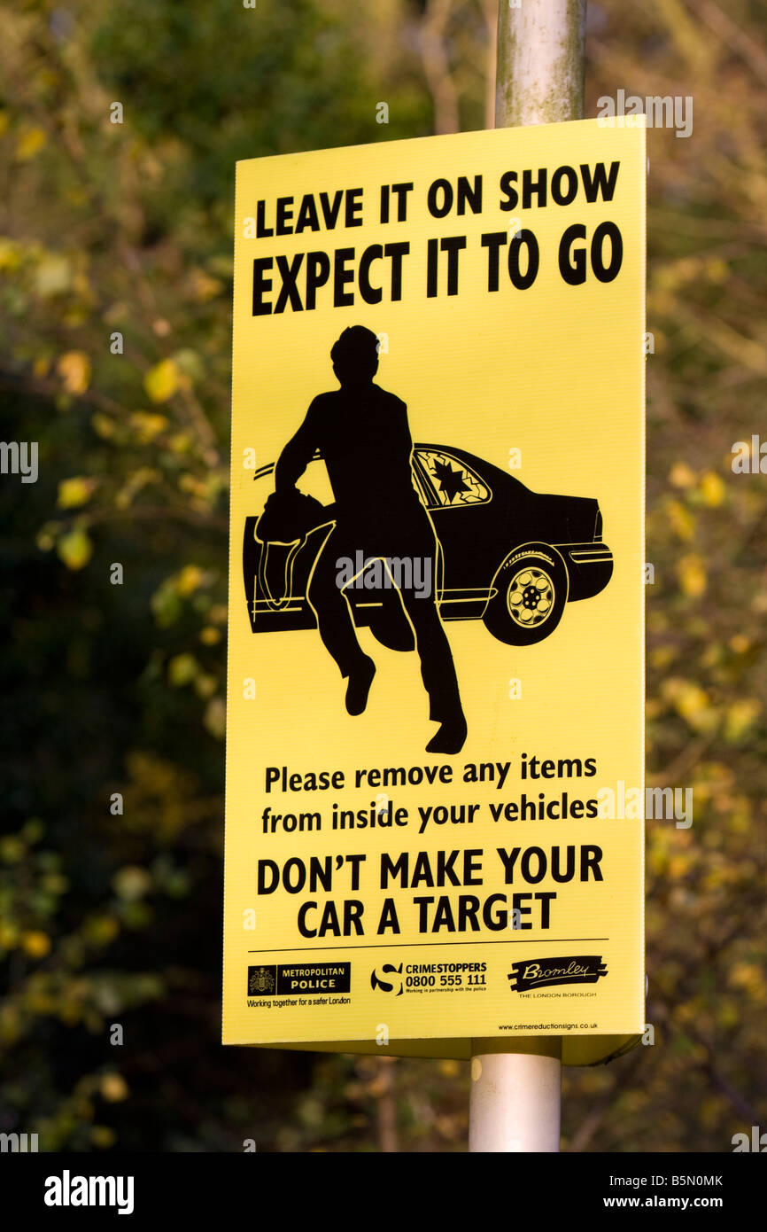 Car park crime prevention sign 'Leave it on show expect it to go' London Borough of Bromley and the Metropolitan Police. Stock Photo