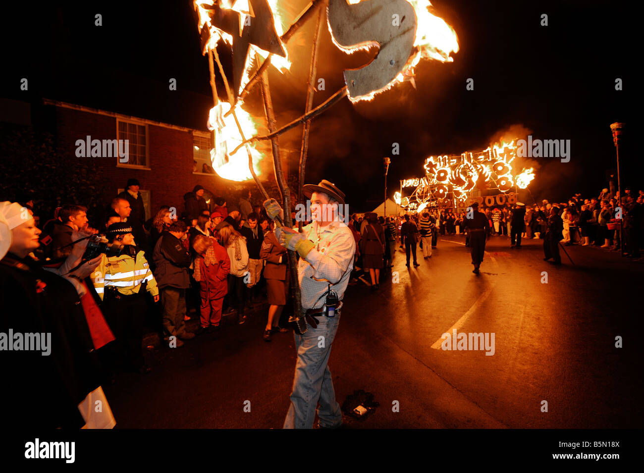 Bonfire night celebrations in East Hoathly near Lewes. Huge firebanners are carried through the village. Picture by Jim Holden. Stock Photo
