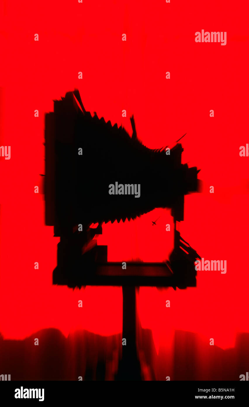 Red silhouette - Studio bellows camera. Stock Photo
