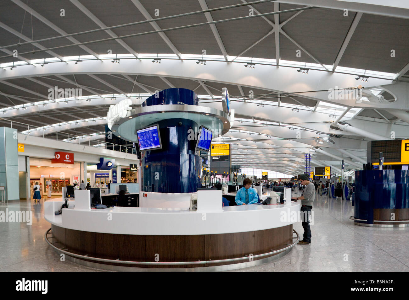 inormation desk, Terminal 5, Heathrow, London, England Stock Photo