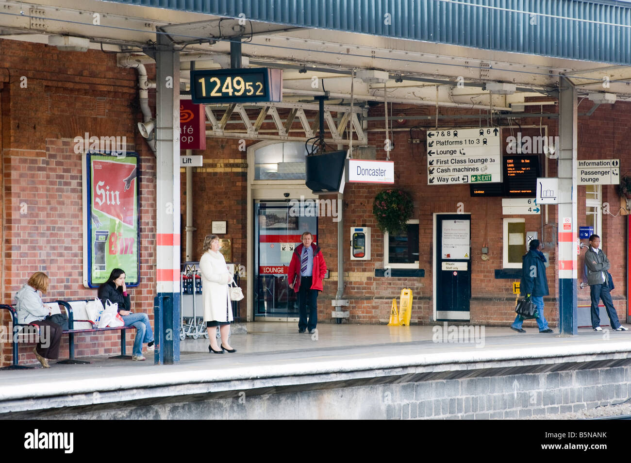Passengers waiting for trains at Doncaster railway station, "South