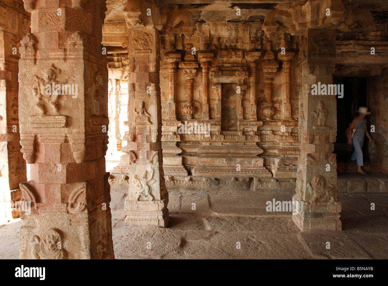 Decorations at the pillars and ceiling of a hindu temple dedicated to ...