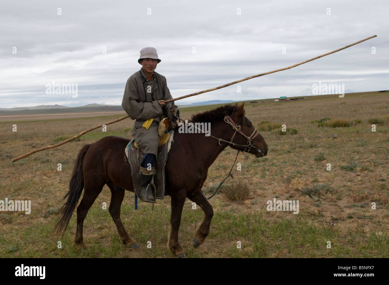 A Mongolian herdsman in the Mongolian grasslands Stock Photo - Alamy