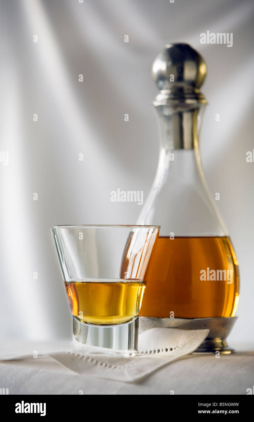 Decanter and glass of scotch Stock Photo