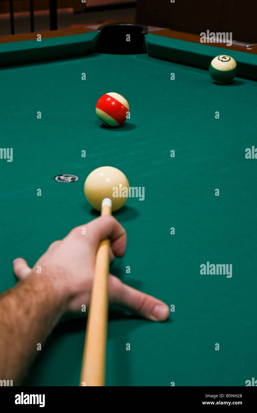 pool hall billiards cue green explode ball shoot concentrate Stock