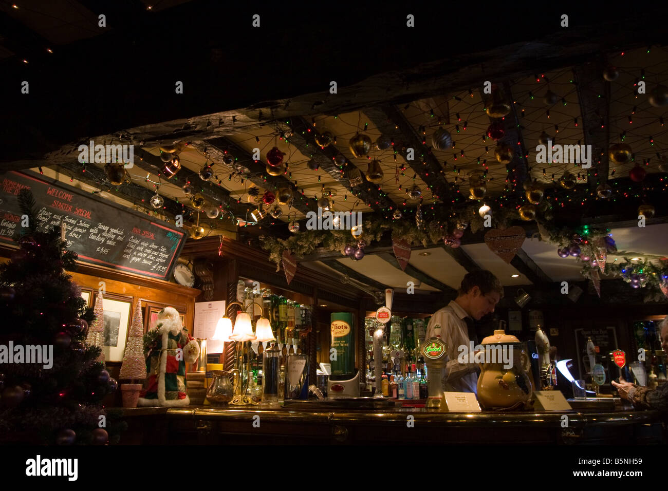 Christmas At The Village Pub Stock Photo - Alamy