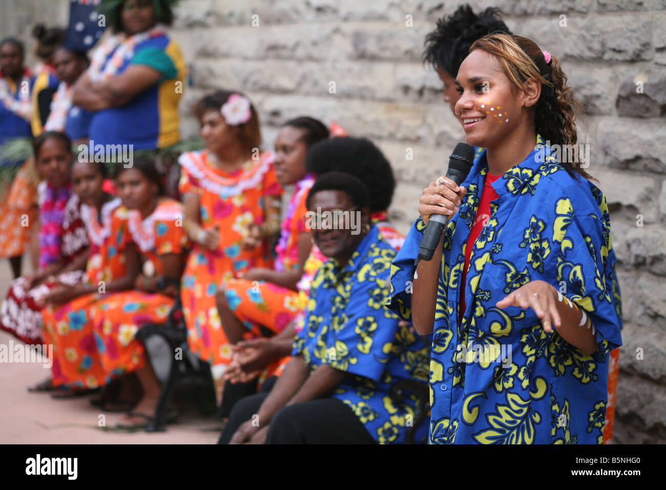 Indigenous Australian student gives a public speech after giving a cultural performance at the Manly International Hotel School Stock Photo