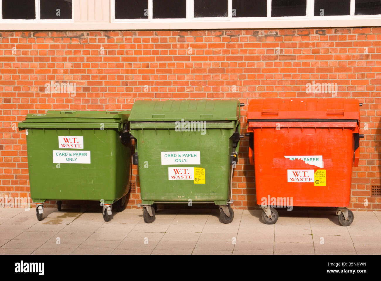 Large recycling bins for card and paper supplied by W.T.waste in green