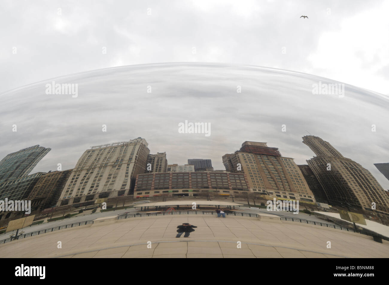 Skyline reflected on The Cloud Gate (aka "the Bean"). Millennium Park ...
