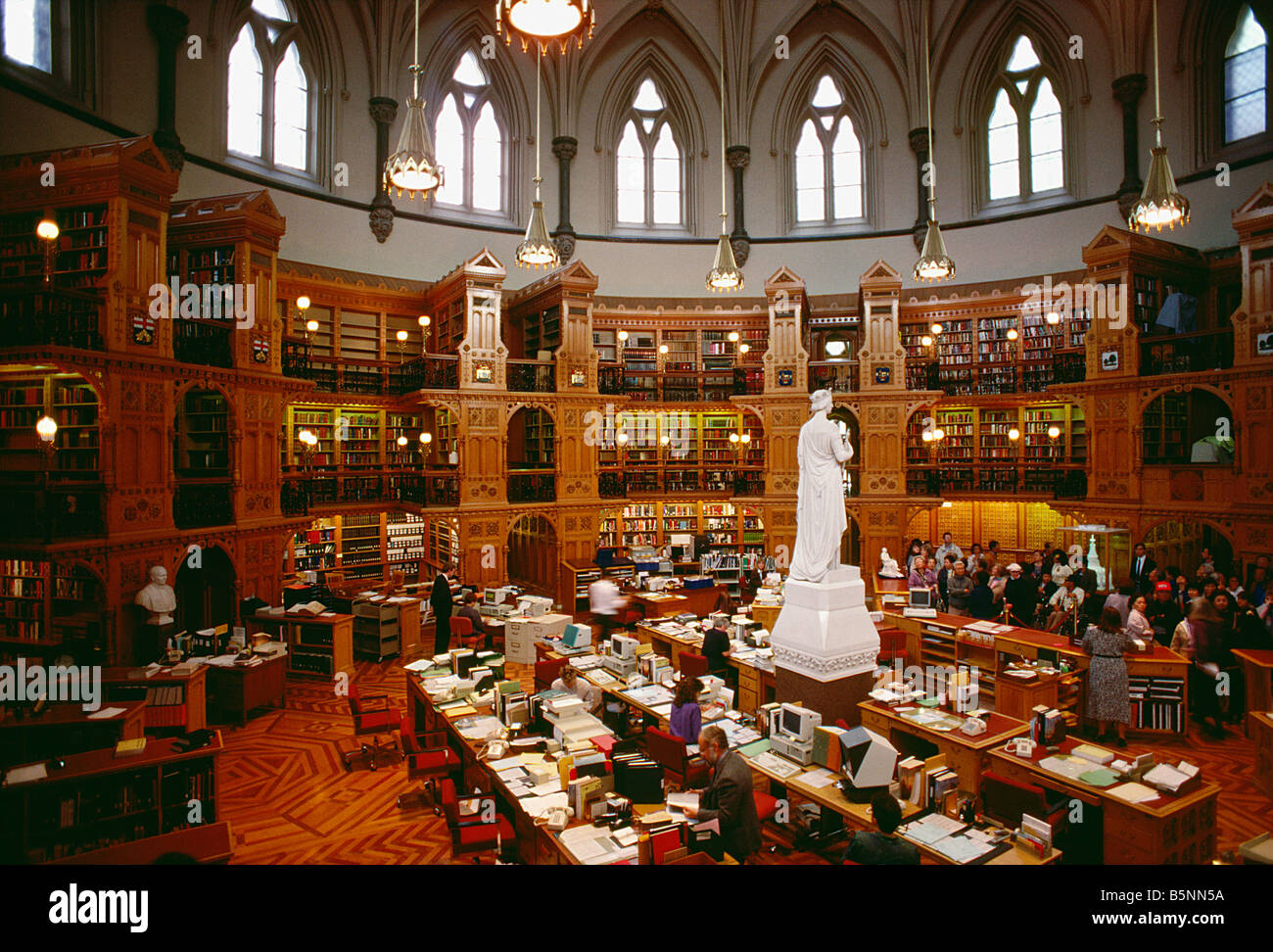 Parliamentary library at Parliament Hill in Ottawa Ontario Canada Parliamentary Tourists looking at statues Stock Photo
