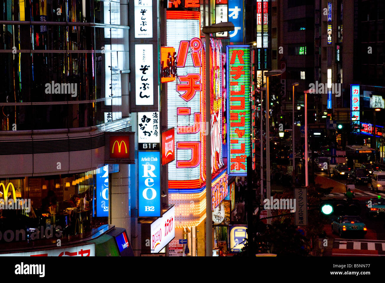 Neon signs in the streets of Shinjuku at night, Tokyo, Japan Stock Photo
