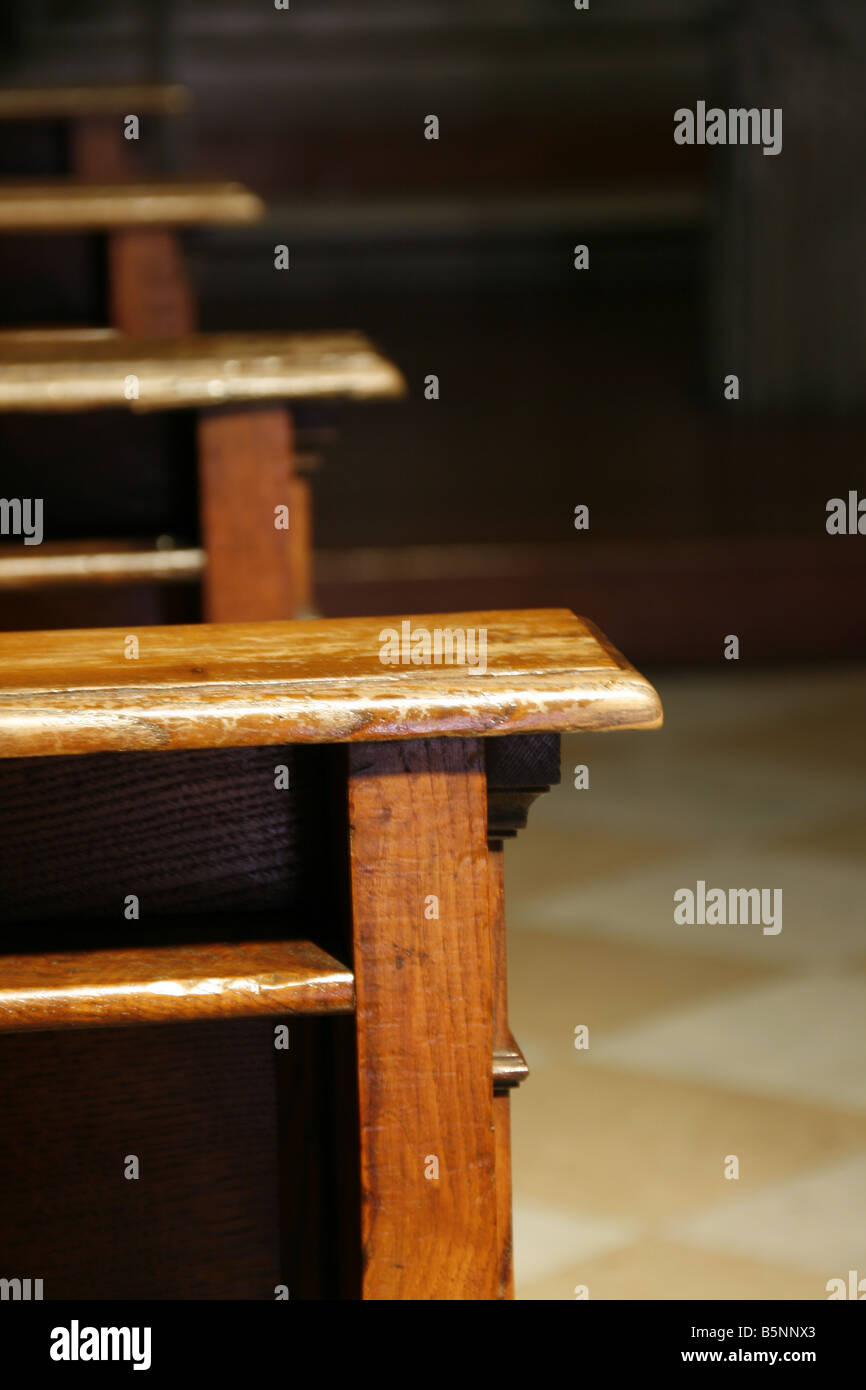 detail of wooden benches in church Stock Photo Alamy