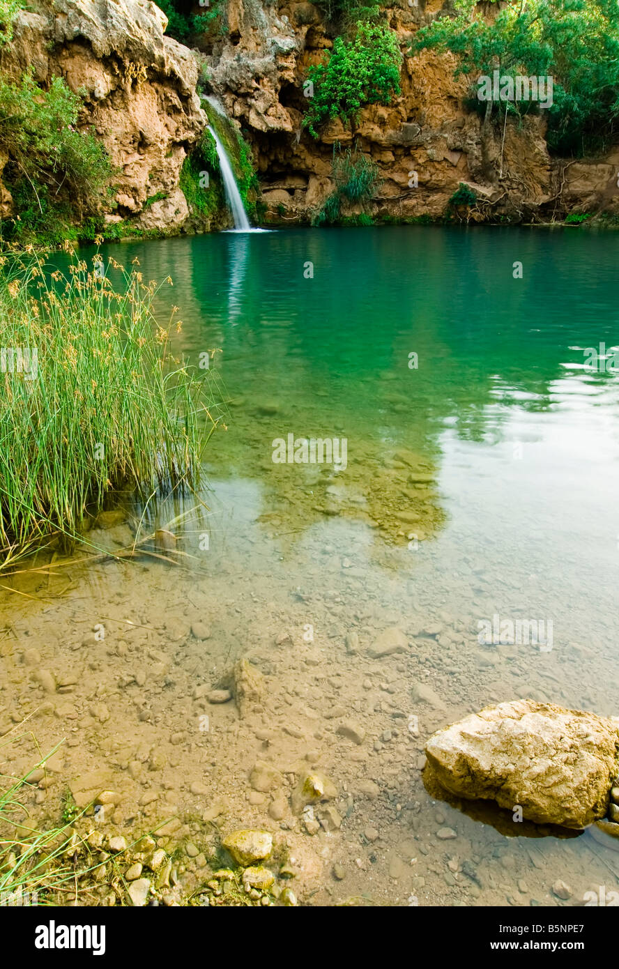 Beautiful waterfall dying in a small lake called Hells Pond Stock Photo