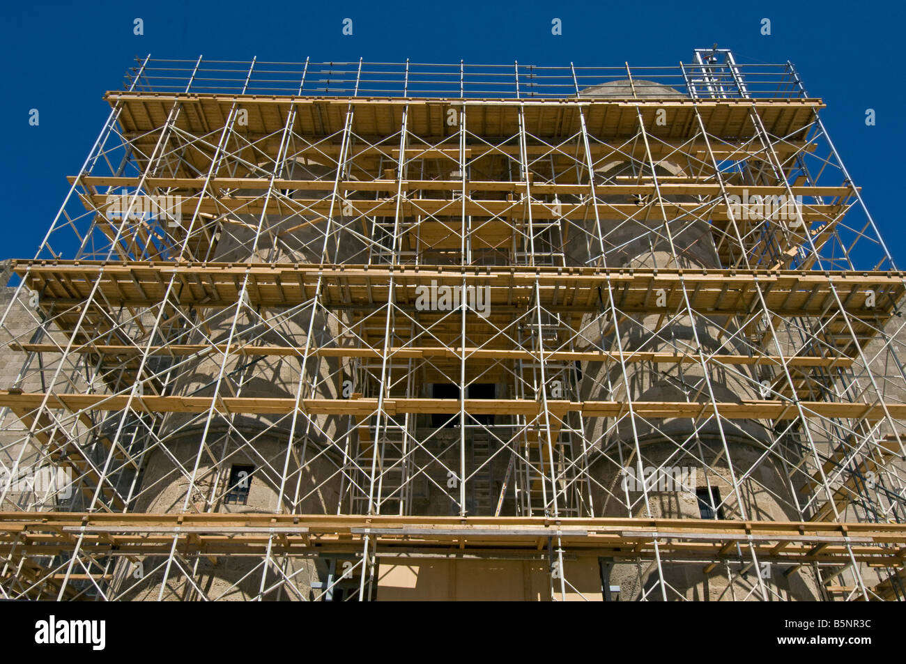 Scaffolding covers the main gateway to the Palace of the Grand Masters in the Old Town of the Island of Rhodes Greece Stock Photo