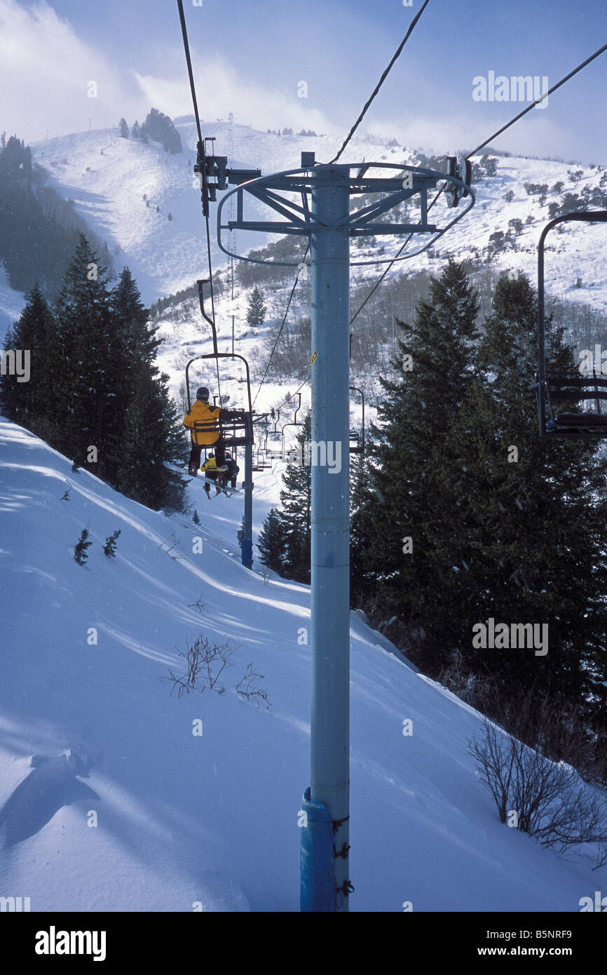 Skiers Ride The Golden Eagle Lift At The Canyons Resort