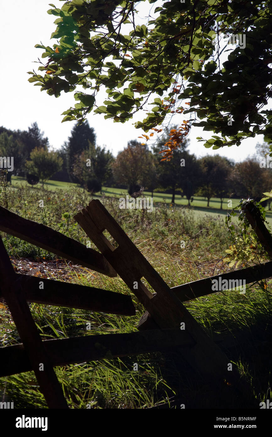 Autumn scene and broken fence over the local golf club at Hubbards Hills, Louth, Lincolnshire, England Stock Photo