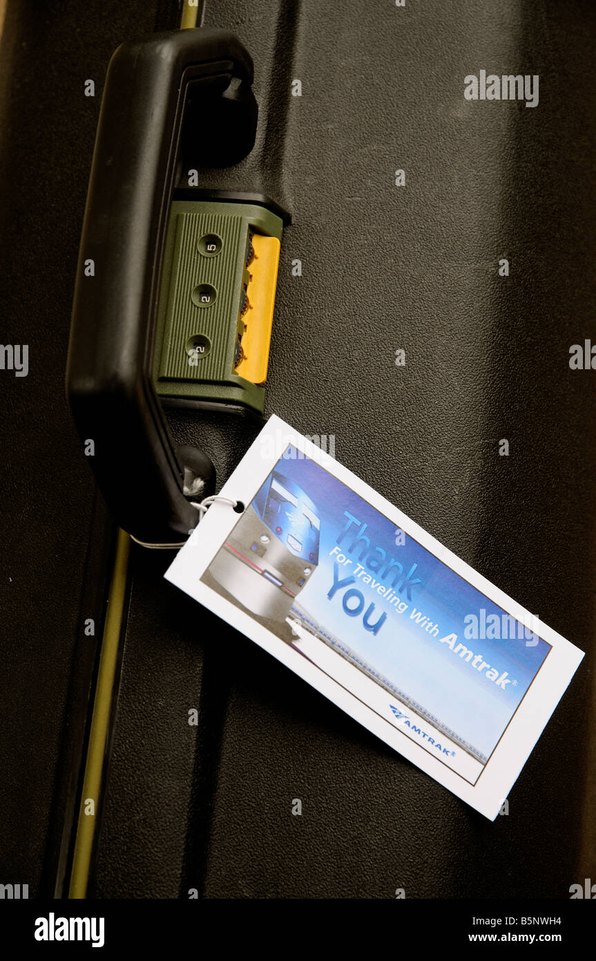 Thank you for travelling Amtrak railroad company luggage label on a suitcase Stock Photo Alamy