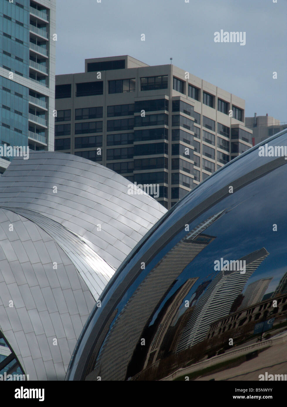Skyline reflected on The Cloud Gate (aka "the Bean"). Millennium Park ...