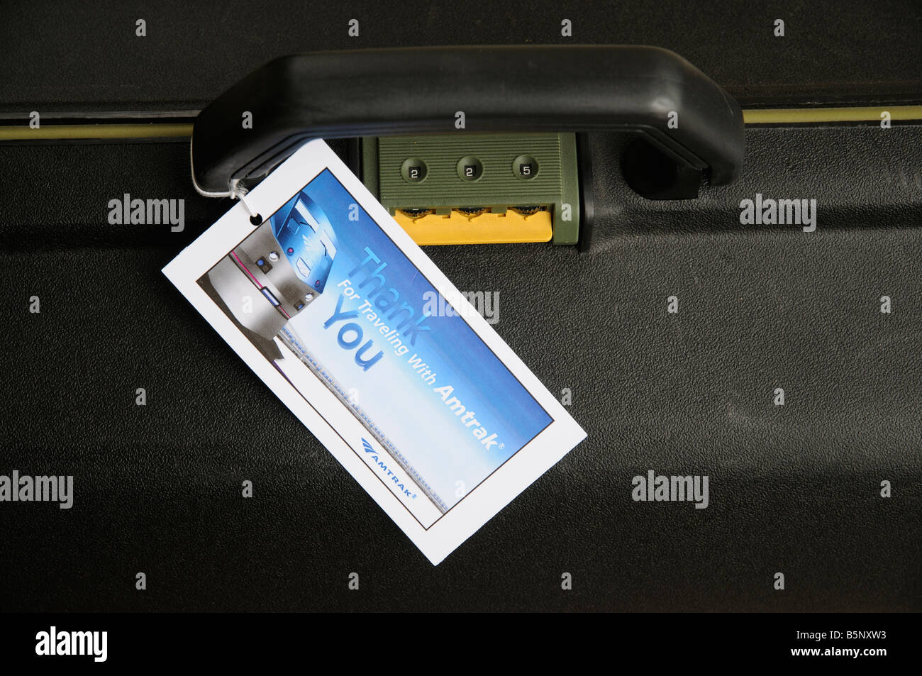 Thank you for travelling Amtrak railroad company luggage label on a suitcase Stock Photo Alamy