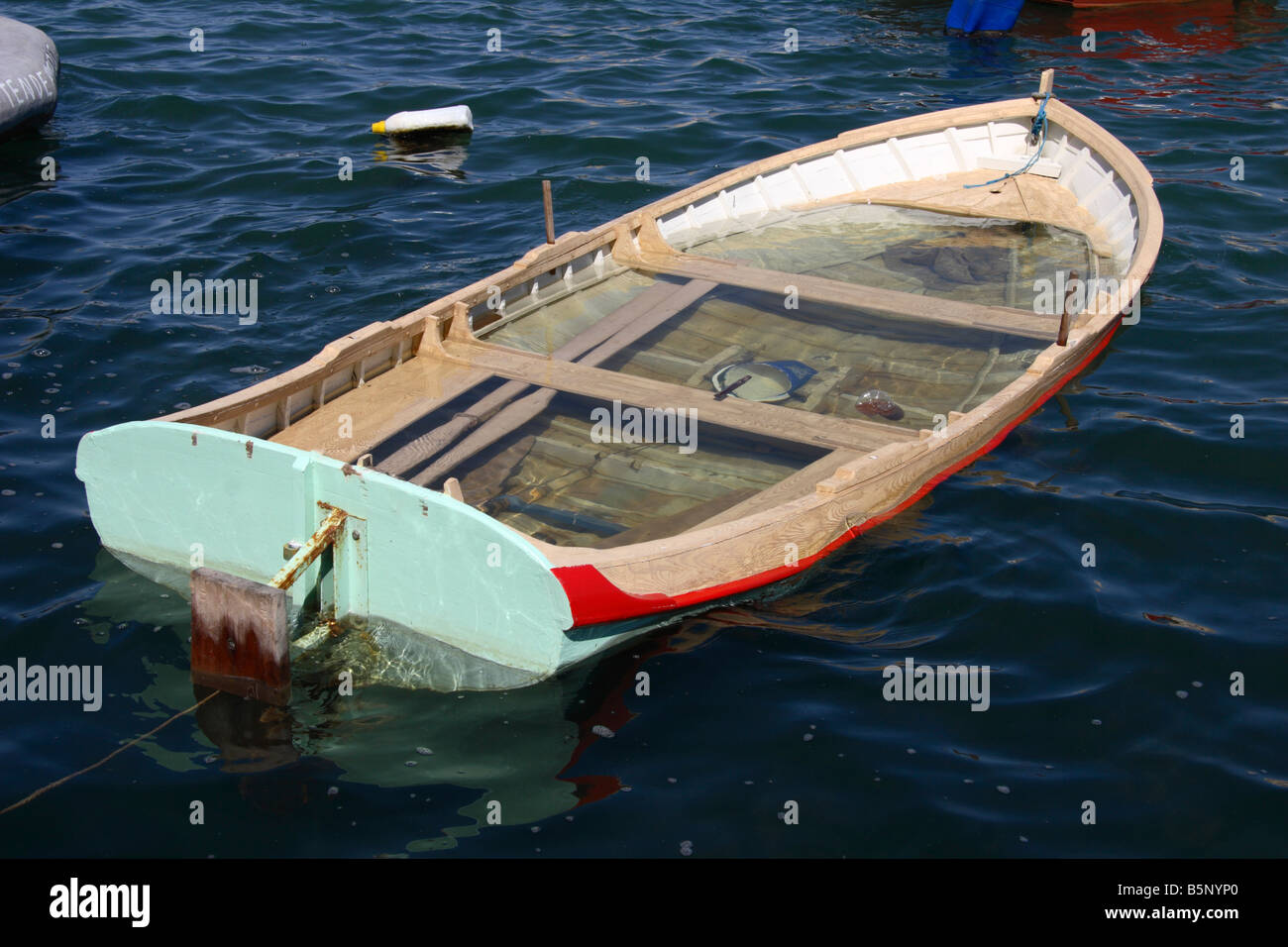 A sinking boat. Stock Photo