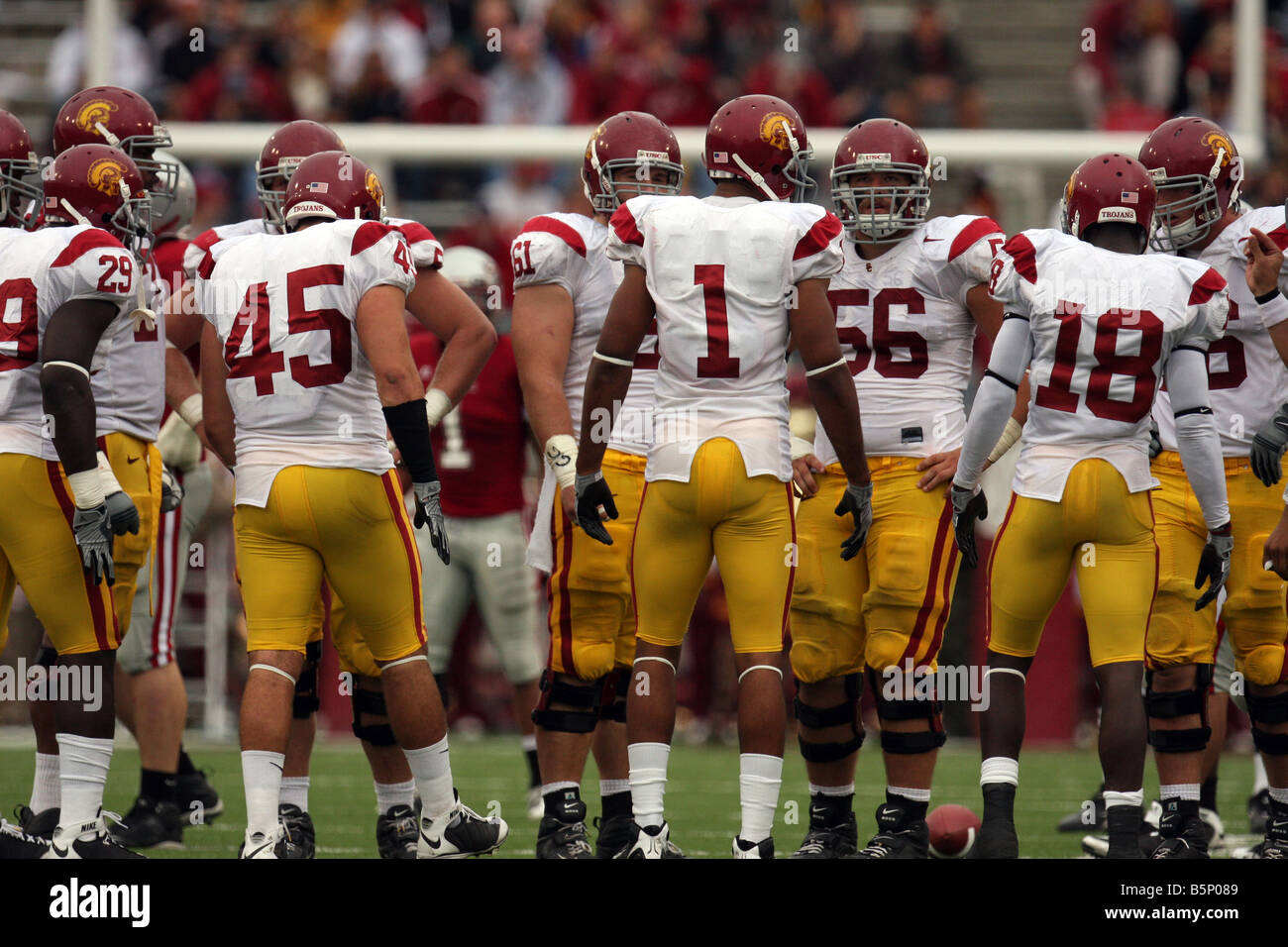 The USC offense, including Adam Goodwin (#45), Patrick Turner (#1), Alex Parsons (#56) and Damian Williams (#18) huddles up. Stock Photo