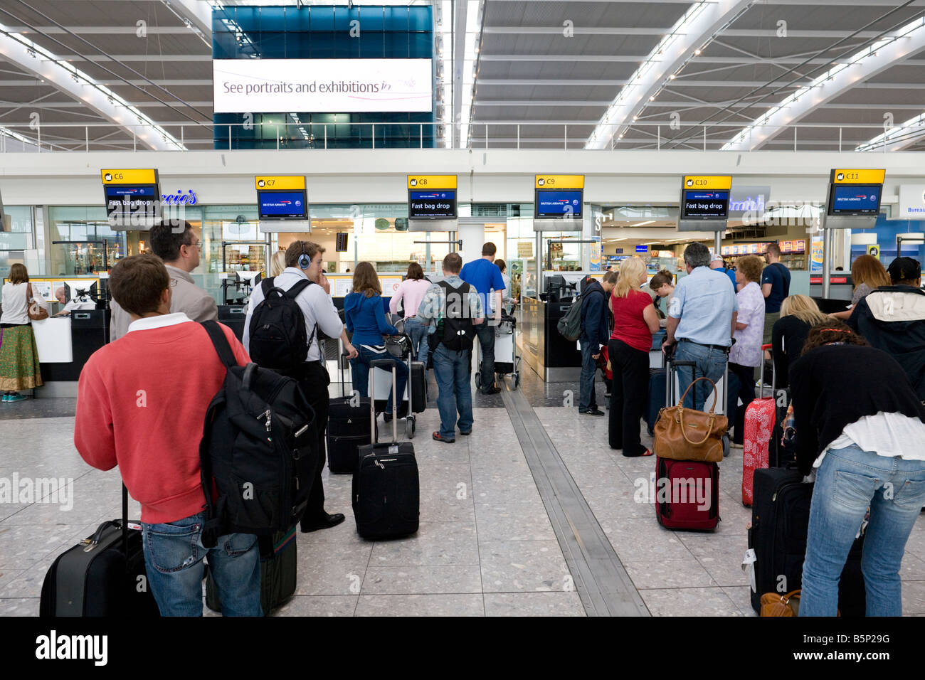 self check in and bag drop, departure level, Terminal 5, Heathrow, London,  England Stock Photo - Alamy